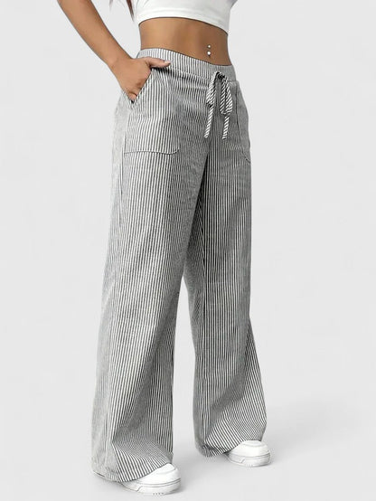 NOMI | Ruime en comfortabele broeken met elegante details