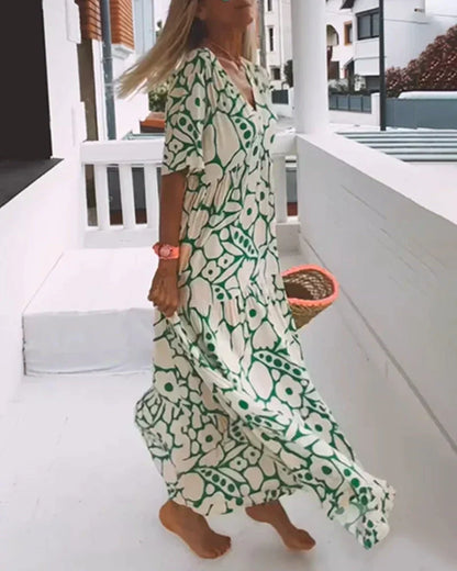 KIONA | Lange Zomerjurk met Vloeiende Snit en Elegante Grafische Motief