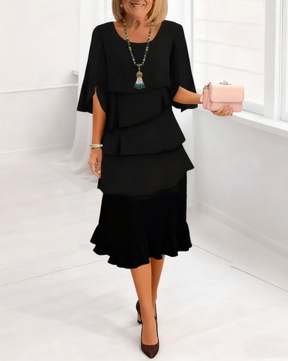 KITA | Elegante midi-jurk met ruffle-stijl mouwen