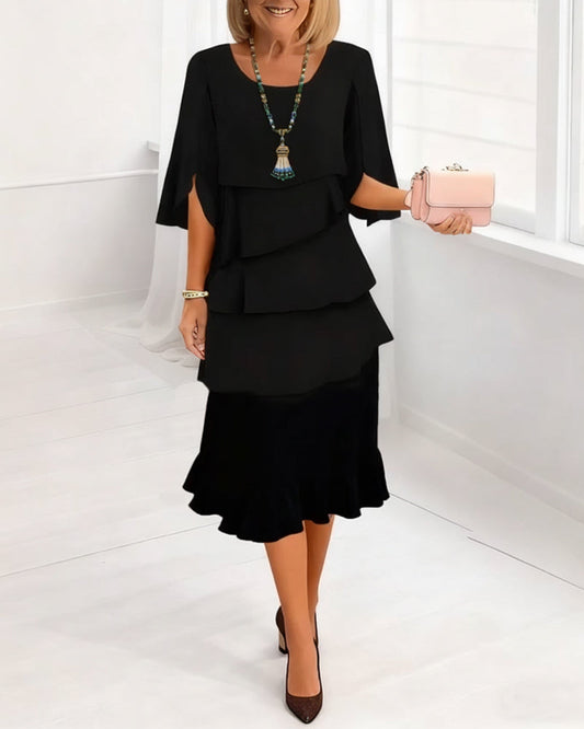 KITA | Elegante midi-jurk met ruffle-stijl mouwen
